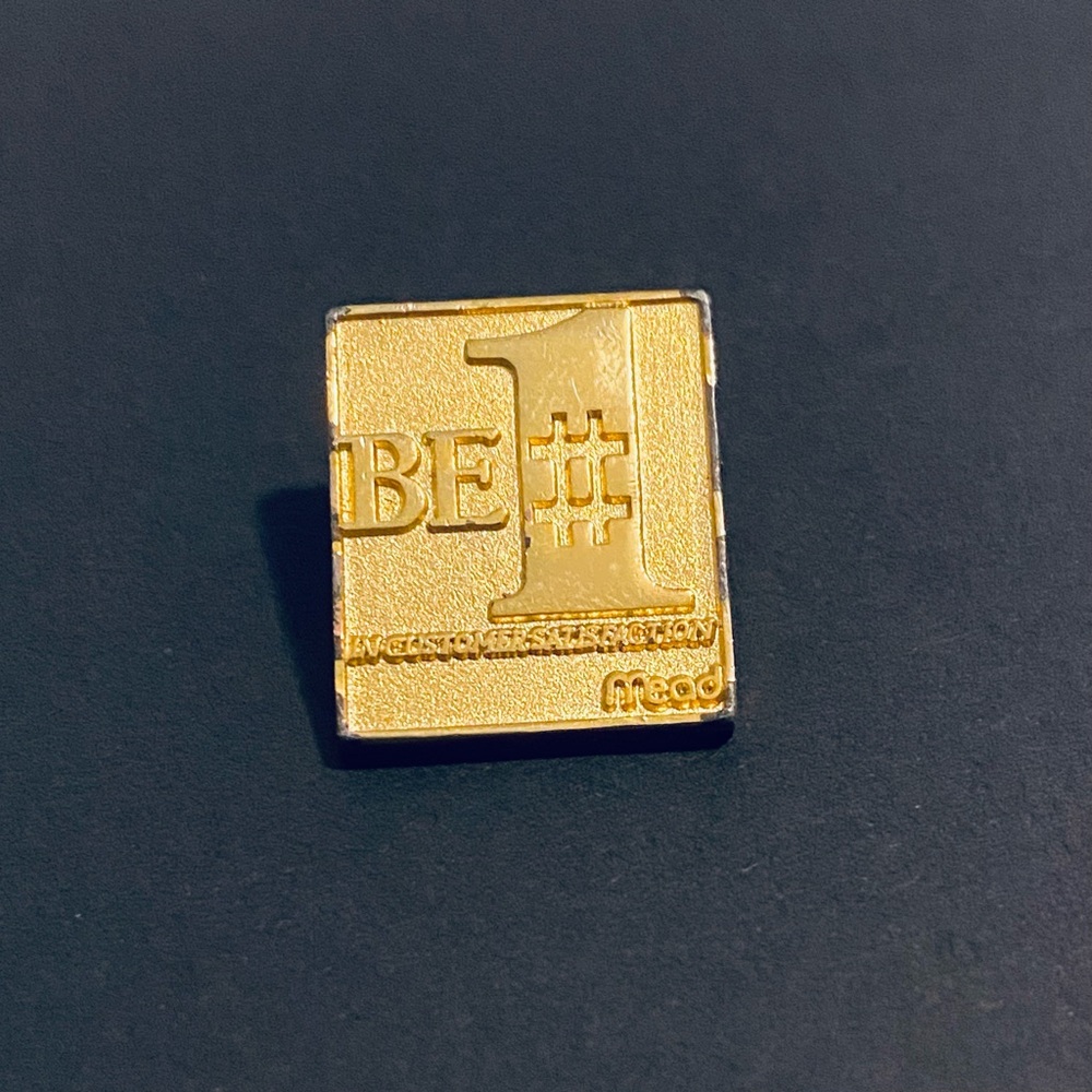 Vintage gold-tone MEAD company lapel pin